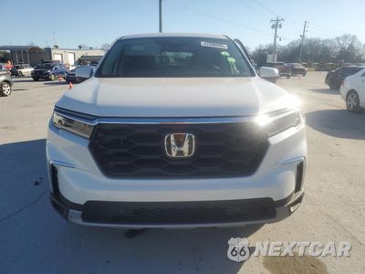 Piąte zdjęcie samochodu w środku: 2025 HONDA PILOT EXL VIN:5FNYG1H40SB086099 - miniatura