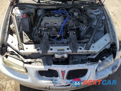 Zdjęcie 11 z 13 samochodu: 2002 PONTIAC GRAND PRIX SE VIN:1G2WK52J22F115047 - miniatura