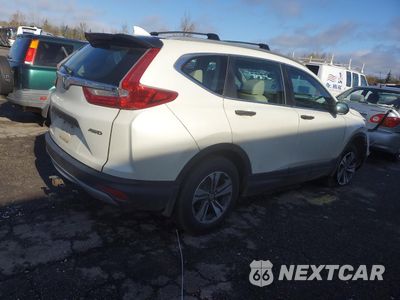 Trzecie zdjęcie samochodu z tyłu: 2018 HONDA CR-V LX VIN:2HKRW6H37JH231151 - miniatura