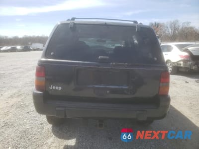 Zdjęcie 6 z 15 samochodu: 1996 JEEP GRAND CHEROKEE LAREDO VIN:1J4EZ58S4TC103918 - miniatura
