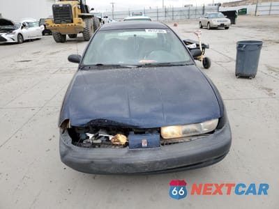 Piąte zdjęcie samochodu w środku: 1999 SATURN SL1 VIN:1G8ZH5289XZ195600 - miniatura