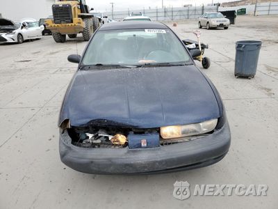 Piąte zdjęcie samochodu w środku: 1999 SATURN SL1 VIN:1G8ZH5289XZ195600 - miniatura