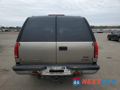 Zdjęcie 6 z 13 samochodu: 1999 GMC SUBURBAN K1500 VIN:1GKFK16R5XJ708995 - miniatura