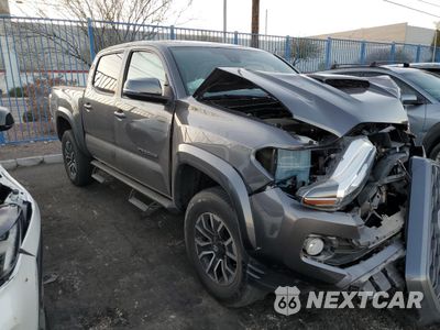 Czwarte zdjęcie samochodu z boku: 2021 TOYOTA TACOMA DOUBLE CAB VIN:5TFCZ5AN1MX271650 - miniatura