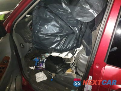 Zdjęcie 7 z 12 samochodu: 2003 KIA SEDONA EX VIN:KNDUP131136420326 - miniatura