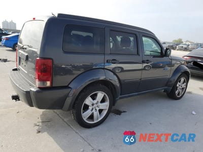 Trzecie zdjęcie samochodu z tyłu: 2011 DODGE NITRO HEAT VIN:1D4PT4GK2BW576387 - miniatura