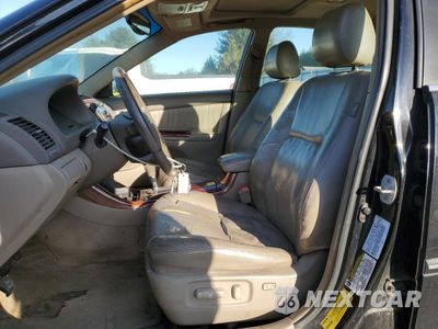 Zdjęcie 7 z 12 samochodu: 2004 TOYOTA CAMRY LE VIN:4T1BF30K34U064215 - miniatura