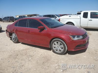 Czwarte zdjęcie samochodu z boku: 2017 VOLKSWAGEN JETTA S VIN:3VW2B7AJ6HM295632 - miniatura