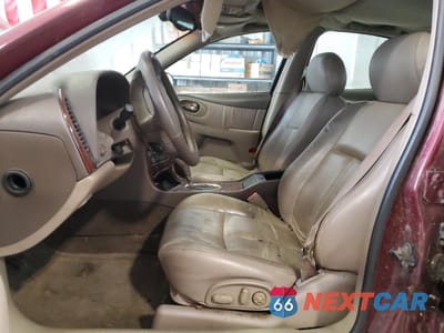 Zdjęcie 7 z 12 samochodu: 2001 OLDSMOBILE AURORA 4.0 VIN:1G3GS64C814122616 - miniatura