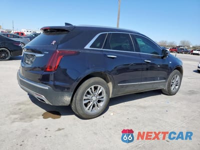 Trzecie zdjęcie samochodu z tyłu: 2021 CADILLAC XT5 PREMIUM LUXURY VIN:1GYKNCRS0MZ126161 - miniatura