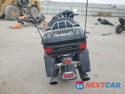 Czwarte zdjęcie samochodu z boku: 2010 HARLEY-DAVIDSON FLHTK VIN:1HD1KEM1XAB630448 - miniatura