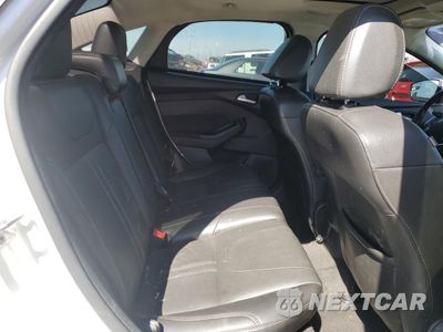 Zdjęcie 10 z 12 samochodu: 2014 FORD FOCUS TITANIUM VIN:1FADP3J22EL135247 - miniatura