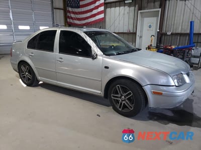 Czwarte zdjęcie samochodu z boku: 2002 VOLKSWAGEN JETTA GLS VIN:3VWSE69MX2M047004 - miniatura