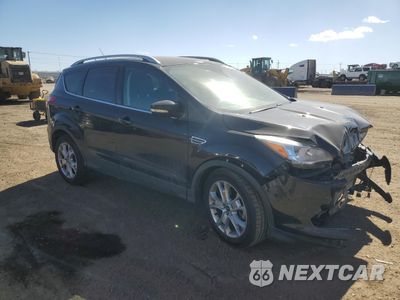 Czwarte zdjęcie samochodu z boku: 2015 FORD ESCAPE TITANIUM VIN:1FMCU9J97FUC25550 - miniatura