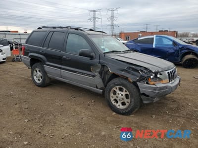 Czwarte zdjęcie samochodu z boku: 2000 JEEP GRAND CHEROKEE LAREDO VIN:1J4GW4856YC420845 - miniatura