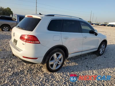 Trzecie zdjęcie samochodu z tyłu: 2014 VOLKSWAGEN TOUAREG V6 TDI VIN:WVGEP9BP0ED001256 - miniatura