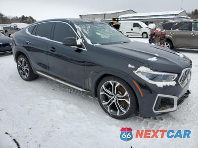 Czwarte zdjęcie samochodu z boku: 2021 BMW X6 SDRIVE 40I VIN:5UXCY4C03M9H58300 - miniatura