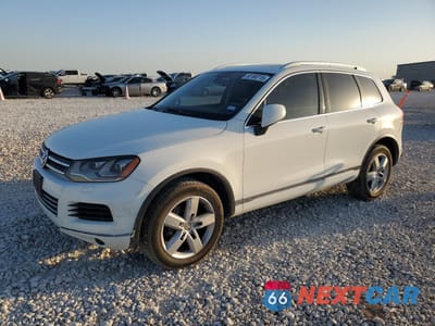 2014 VOLKSWAGEN TOUAREG V6 TDI WVGEP9BP0ED001256 - główne zdjęcie licytacji z USA - miniatura