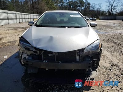 Piąte zdjęcie samochodu w środku: 2017 TOYOTA COROLLA L VIN:5YFBURHE2HP586638 - miniatura