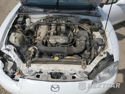 Zdjęcie 11 z 12 samochodu: 2002 MAZDA MX-5 MIATA BASE VIN:JM1NB353720234398 - miniatura
