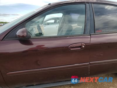 Zdjęcie 7 z 12 samochodu: 2000 FORD TAURUS SES VIN:1FAFP55U3YA227807 - miniatura