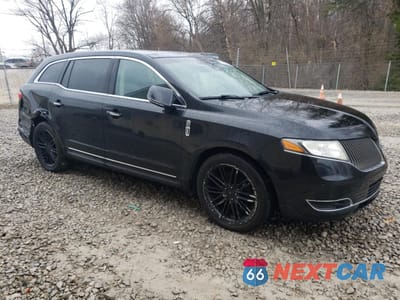 Czwarte zdjęcie samochodu z boku: 2013 LINCOLN MKT VIN:2LMHJ5AT4DBL53237 - miniatura