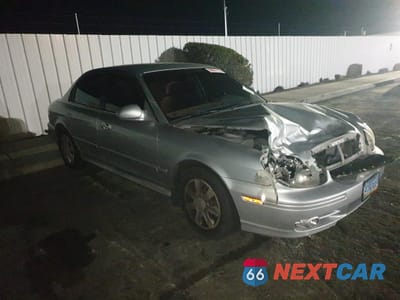 Czwarte zdjęcie samochodu z boku: 2003 HYUNDAI SONATA GL VIN:KMHWF25S63A761771 - miniatura