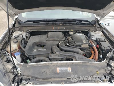 Zdjęcie 11 z 12 samochodu: 2017 FORD FUSION SE HYBRID VIN:3FA6P0LU0HR409265 - miniatura