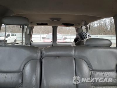 Zdjęcie 10 z 13 samochodu: 1999 GMC SUBURBAN K1500 VIN:1GKFK16R5XJ708995 - miniatura