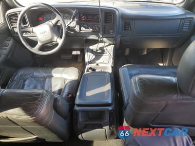Zdjęcie 8 z 14 samochodu: 2000 GMC NEW SIERRA C2500 VIN:1GTFC29U6YE354641 - miniatura