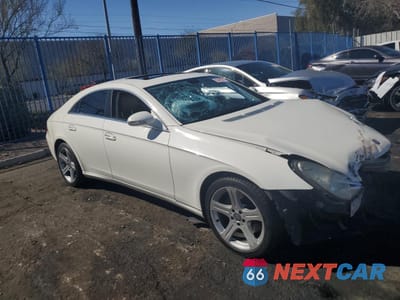 Czwarte zdjęcie samochodu z boku: 2006 MERCEDES-BENZ CLS 500C VIN:WDDDJ75X66A075100 - miniatura