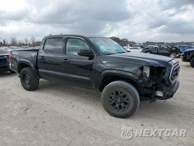 Czwarte zdjęcie samochodu z boku: 2023 TOYOTA TACOMA DOUBLE CAB VIN:3TMAZ5CN0PM210832 - miniatura