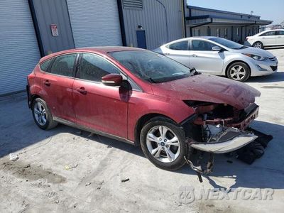 Czwarte zdjęcie samochodu z boku: 2014 FORD FOCUS SE VIN:1FADP3K29EL347755 - miniatura