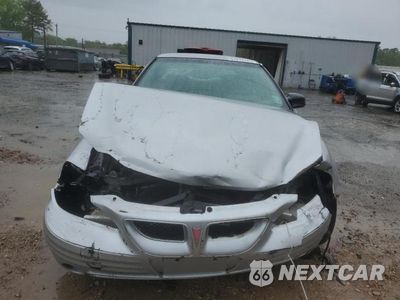 Piąte zdjęcie samochodu w środku: 2001 PONTIAC GRAND AM SE VIN:1G2NE52T61M642054 - miniatura