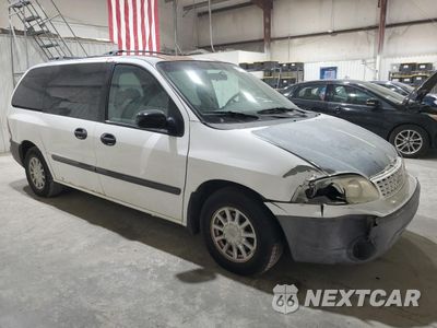 Czwarte zdjęcie samochodu z boku: 2001 FORD WINDSTAR LX VIN:2FMZA51411BB21523 - miniatura