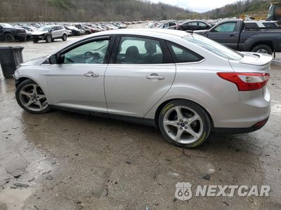 Drugie zdjęcie samochodu z przodu: 2014 FORD FOCUS TITANIUM VIN:1FADP3J2XEL222328 - miniatura