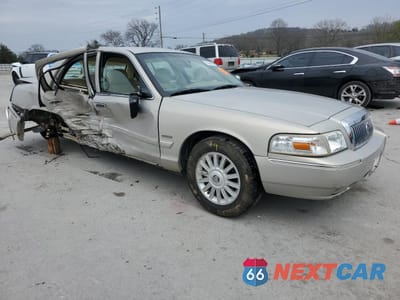 Czwarte zdjęcie samochodu z boku: 2010 MERCURY GRAND MARQUIS LS VIN:2MEBM7FV8AX605314 - miniatura