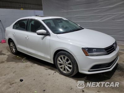 Czwarte zdjęcie samochodu z boku: 2017 VOLKSWAGEN JETTA SE VIN:3VWB67AJ8HM299895 - miniatura