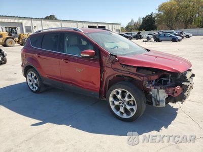 Czwarte zdjęcie samochodu z boku: 2014 FORD ESCAPE TITANIUM VIN:1FMCU0J90EUC89732 - miniatura