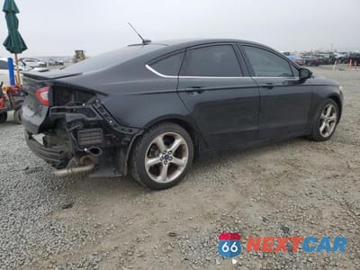 Trzecie zdjęcie samochodu z tyłu: 2016 FORD FUSION S VIN:3FA6P0G77GR382696 - miniatura