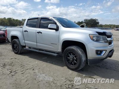 Czwarte zdjęcie samochodu z boku: 2018 CHEVROLET COLORADO VIN:1GCGSBEA3J1280983 - miniatura