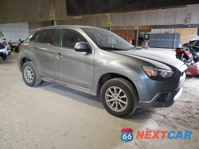 Czwarte zdjęcie samochodu z boku: 2012 MITSUBISHI OUTLANDER SPORT ES VIN:JA4AP3AU2CZ000532 - miniatura