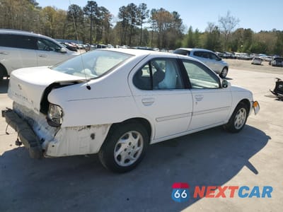 Trzecie zdjęcie samochodu z tyłu: 1999 NISSAN ALTIMA XE VIN:1N4DL01D5XC203412 - miniatura