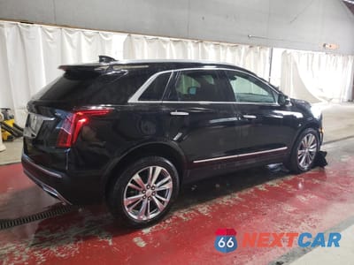 Trzecie zdjęcie samochodu z tyłu: 2024 CADILLAC XT5 PREMIUM LUXURY VIN:1GYKNDRS7RZ722879 - miniatura