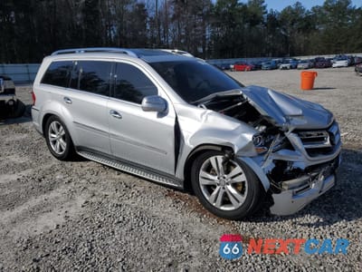 Czwarte zdjęcie samochodu z boku: 2010 MERCEDES-BENZ GL 450 4MATIC VIN:4JGBF7BE2AA559095 - miniatura