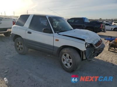 Czwarte zdjęcie samochodu z boku: 1996 TOYOTA RAV4 VIN:JT3XP10V2T0002921 - miniatura