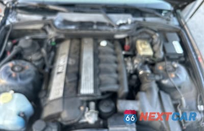 Zdjęcie 7 z 11 samochodu: 1999 BMW 323 IC VIN:WBABJ7333XEA18932 - miniatura