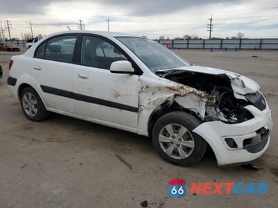 Czwarte zdjęcie samochodu z boku: 2009 KIA RIO BASE VIN:KNADE223996550181 - miniatura