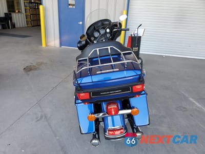 Czwarte zdjęcie samochodu z boku: 2010 HARLEY-DAVIDSON FLHTK VIN:1HD1KEM30AB674640 - miniatura