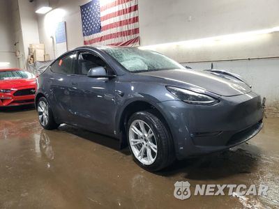 Czwarte zdjęcie samochodu z boku: 2023 TESLA MODEL Y VIN:7SAYGDEE0PF822922 - miniatura